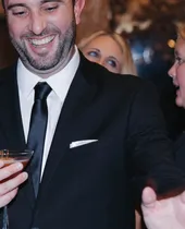 Guests toasting at a Spark event