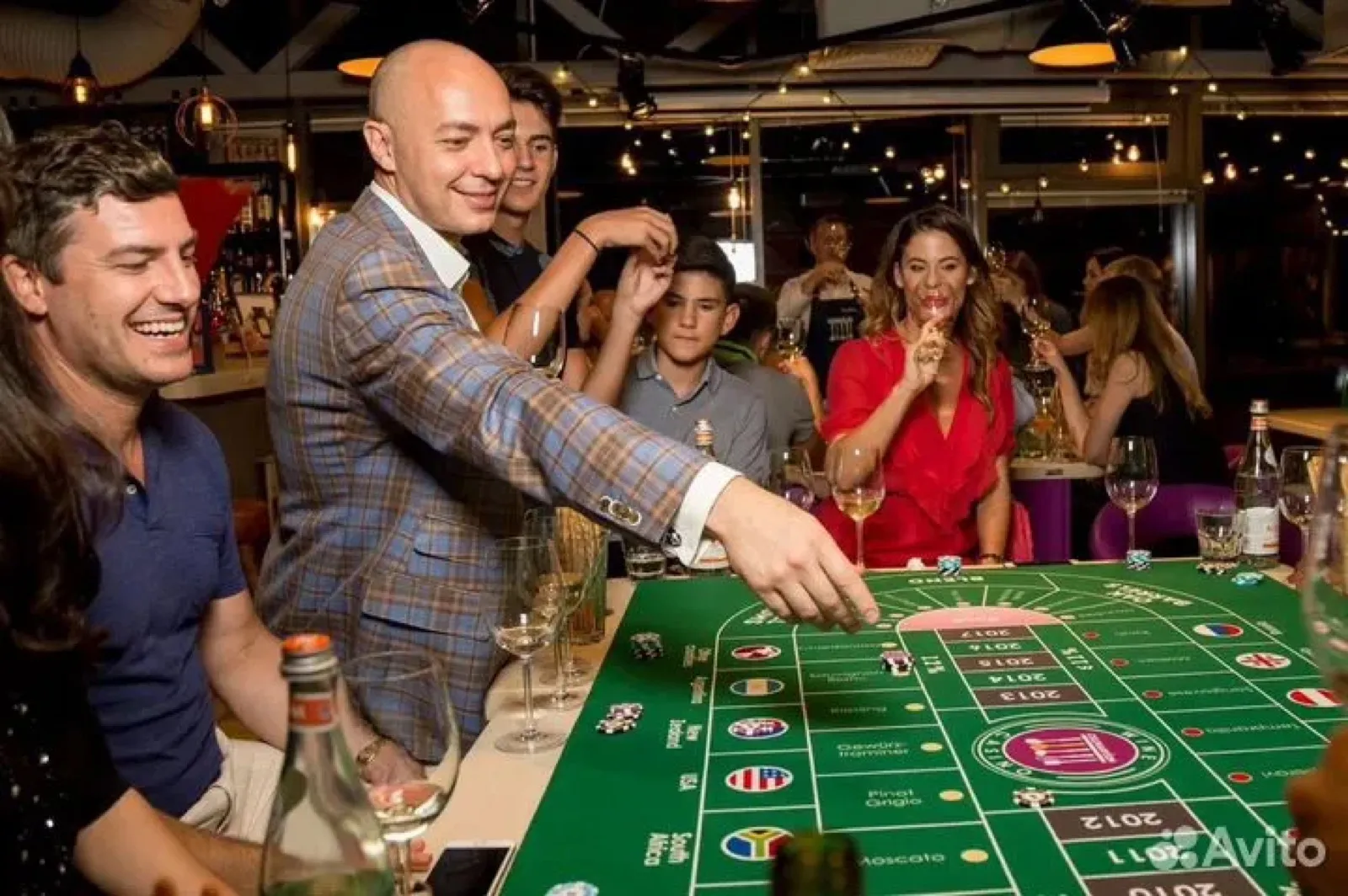 Guests playing craps at a Spark casino night table in Sacramento