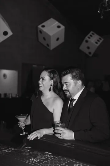 Guests in black tie at the midnight toast of a Spark New Year's Eve casino party