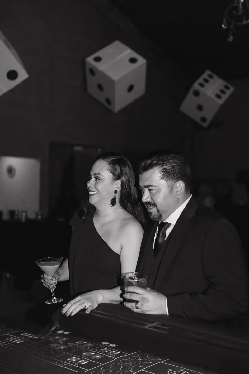 Couple in black tie at a Spark casino night