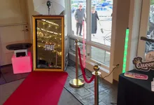 Spark Magic Mirror photo booth with red carpet and velvet ropes
