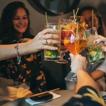 Bartender garnishing a drink