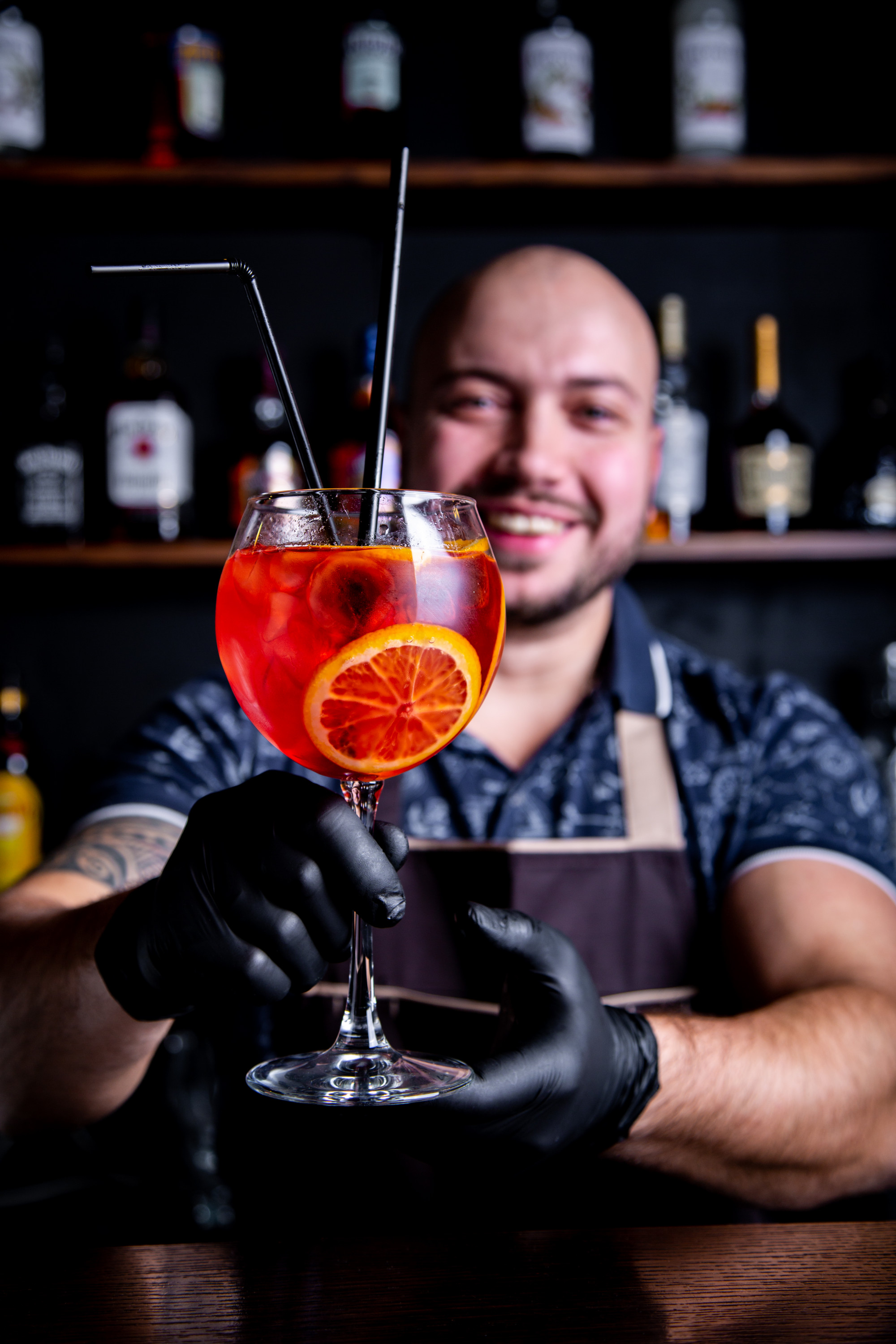 Mixologist preparing cocktails at an event