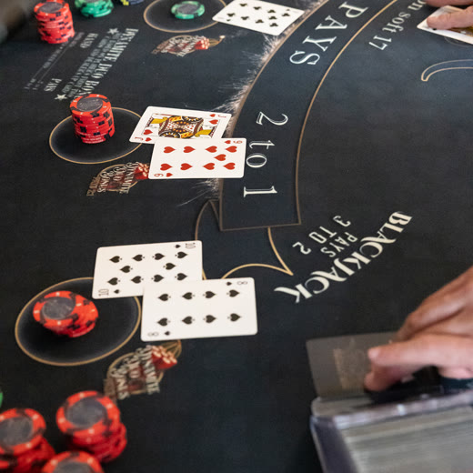 Casino cards and chips on a Spark blackjack felt