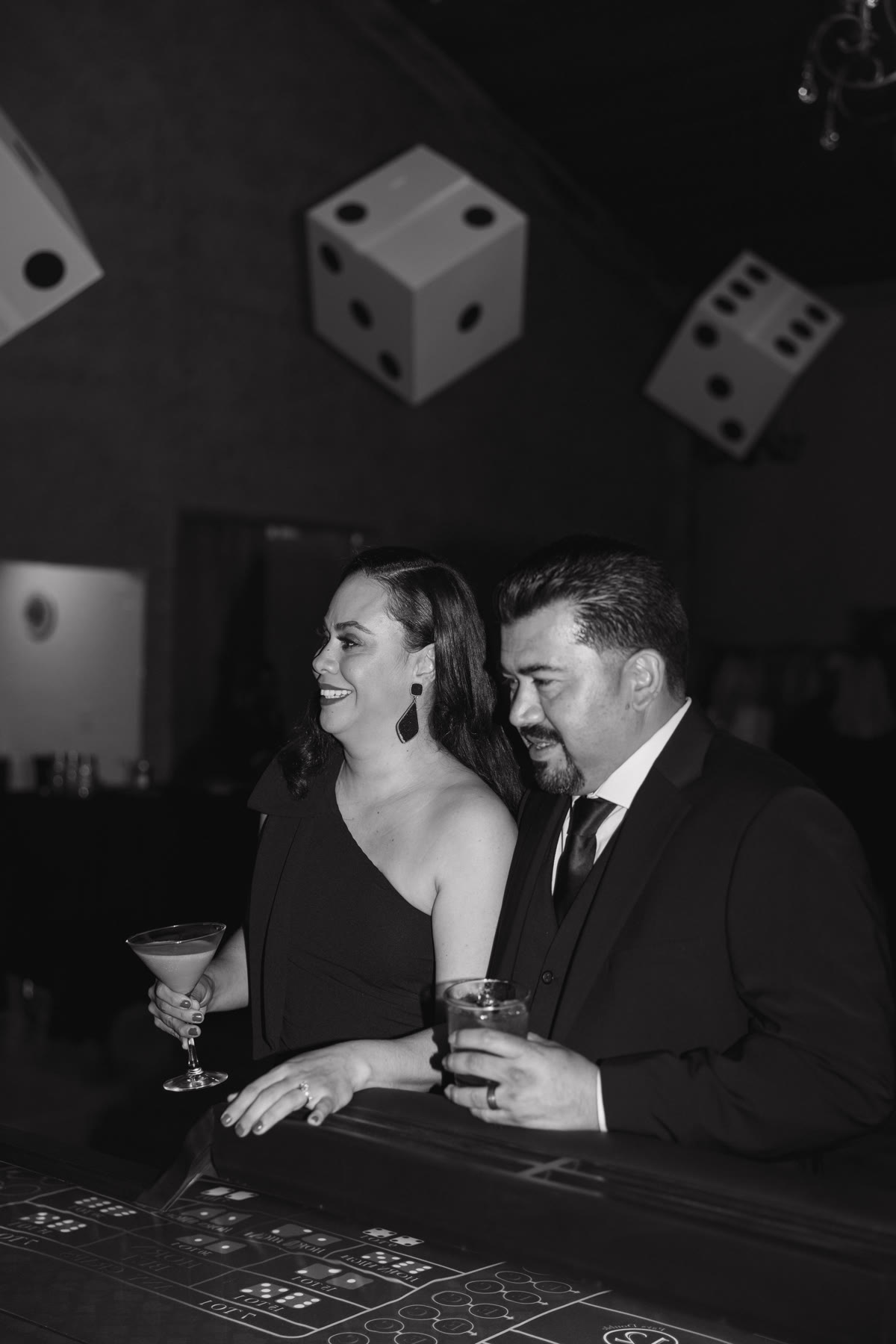Couple in black tie at a Spark casino night