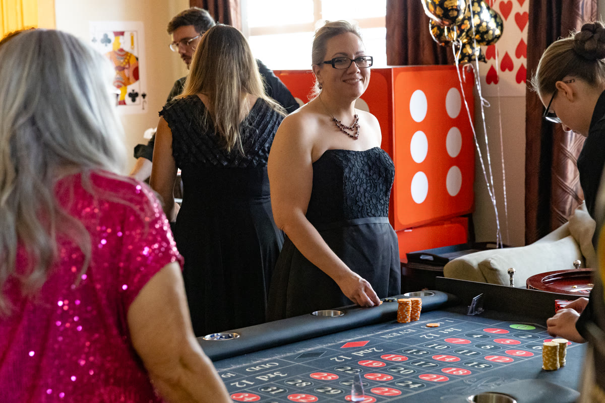 Guests playing roulette at a Spark party