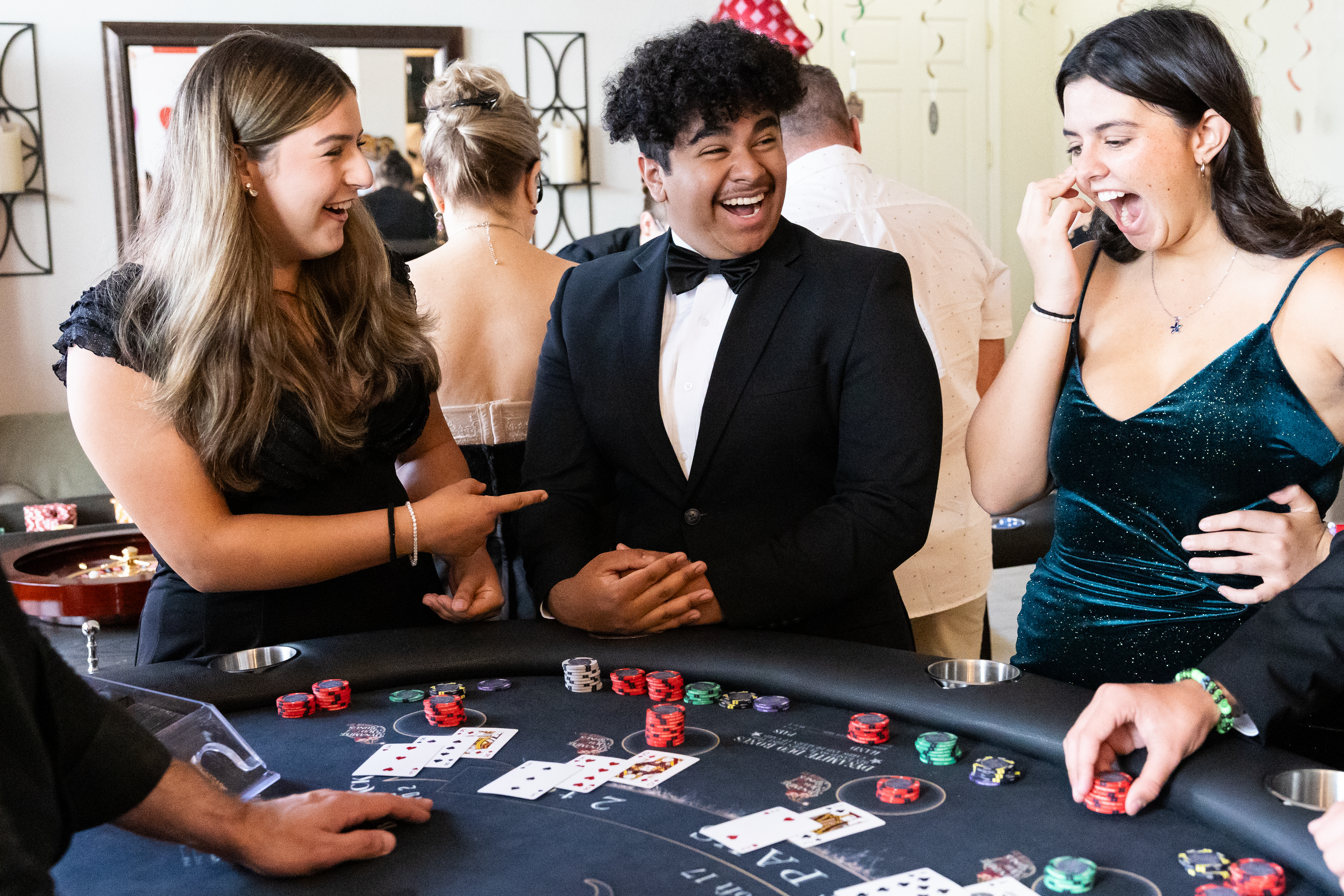 Guests celebrating at a Spark blackjack table